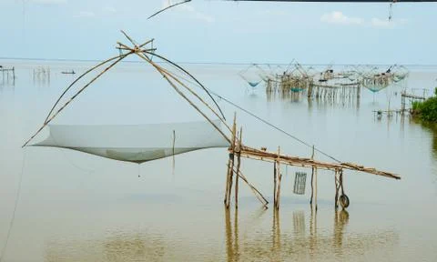 And fish traps in the river Фото