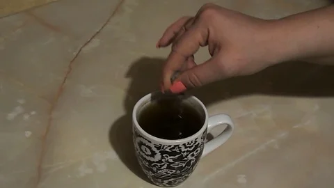 And how do you stir tea with a spoon? Stock Footage 103868494