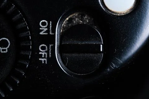 The on and off icon button is close on the flash for camera device. Old and.. Stock Photos