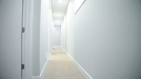 And a long white corridor in the building Stock Footage 101856486