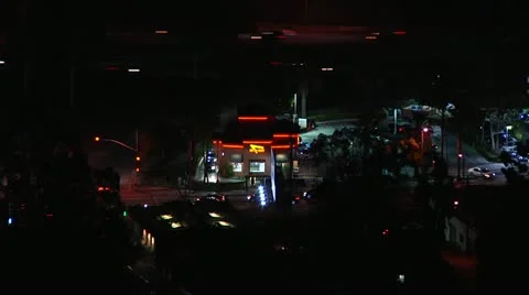 In and Out Burger Time lapsed Night with traffic around Stock Footage 21027696