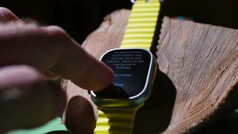 And setting Handwashing notifications on new titanium Apple Watch Ultra Stock Footage 214658098
