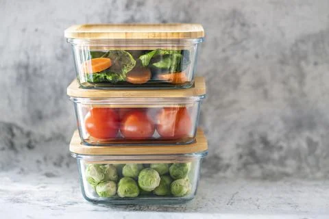 And snacks in containers, gray background. Clean eating, vegetarianism, Stock Photos