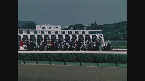And there offGate opens, horses run, at Aqueduct Race Track in Queens, New York, Video stock 82549651
