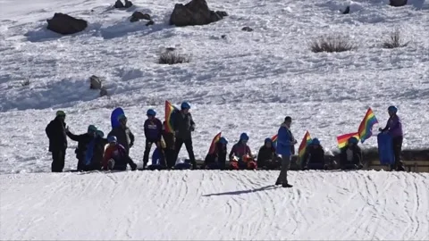 Andean slopes painted in ranbow colors as "Pride Ski" celebrated in Chile for fi Stock Footage 204166810