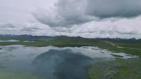 Andes mountain range surrounded by lagoons in the peruvian highlands Stock Footage 288057451