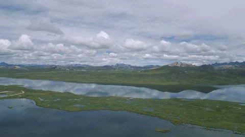 Andes mountain range surrounded by lagoons in the peruvian highlands Stock Footage 288057460