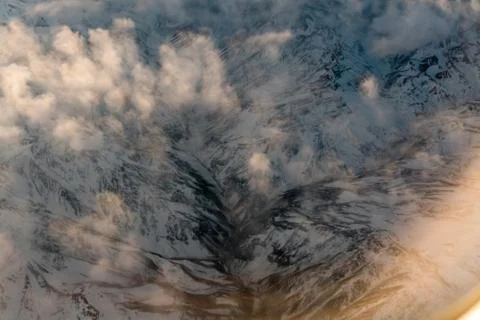 Andes valley covered by clouds Stock Photos
