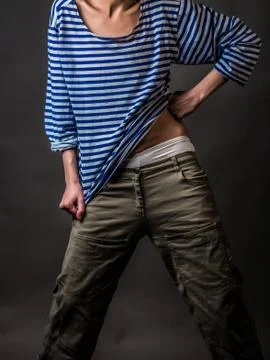 Androgynous character in a striped vest Stock Photos