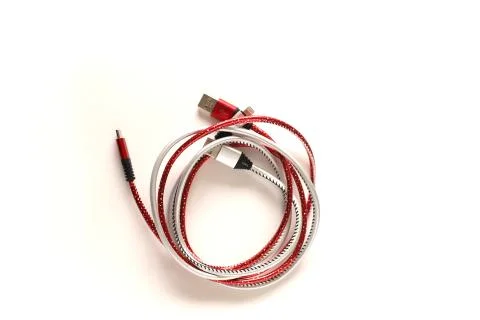 Android charging cable. Two wires twisted around. Wires for charging an iPhon Stock Photos