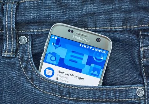 Android Messages mobile application on screen of Samsung Stock Photos