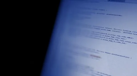 Android mobile development. Application source code on notebook  screen backg 库存照片