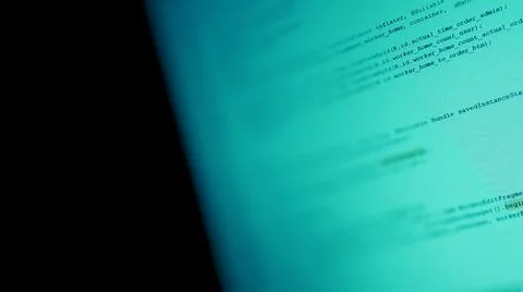 Android mobile development. Application source code on notebook green screen  Stockfoto's