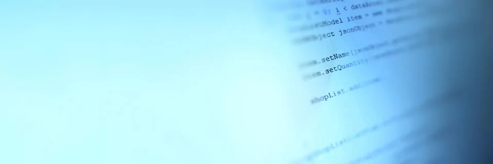 Android mobile development. Application source code on notebook blue screen b Stock Photos