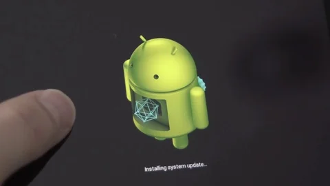 Android Operating System Update with Person Holding Tablet 스톡 동영상 76097964