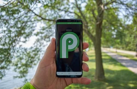 Android P opperating system logo on a screen Stock Photos