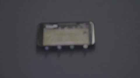 Android Phone Propped on Wall Stock Footage 165608917