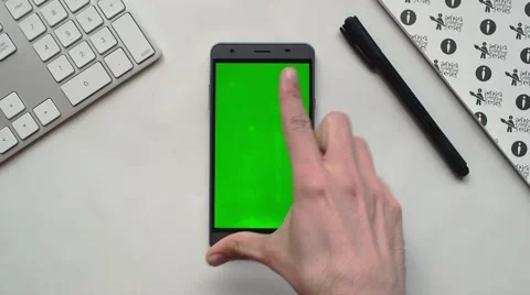 Android smartphone on white desk Stock Footage 63538917