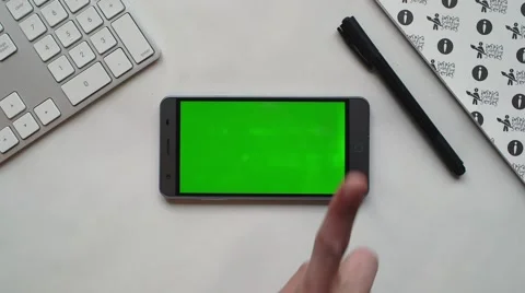Android smartphone on white desk Stock Footage 63539007