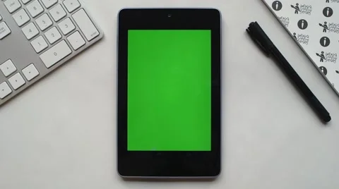 Android tablet on white desk Stock Footage 63538877