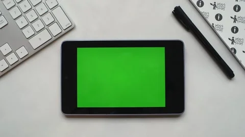 Android tablet on white desk Видео 63538959
