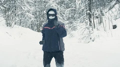 Android walks in snow. Parody of robots Stock Photos