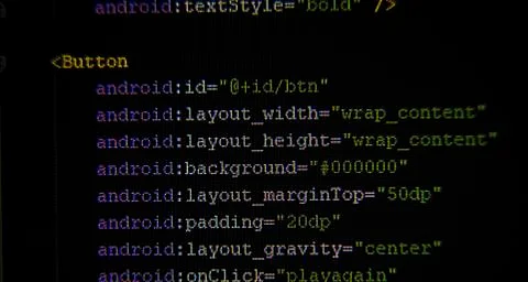 Android xml code on monitor screen in front Stock Photos