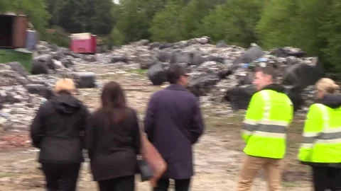 Andy Burnham visits an illegal rubbish dump beside Bradford City´s Valley Parad Video stock 342815342