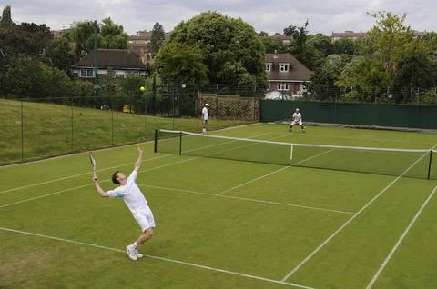 Andy Murray Is Pictured During A Practice Session Wth Rafael Nadal At Wimbledon. Stock Photos