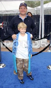 Andy richter and son.los angeles premiere of dreamworks animation's monsters Stock Photos