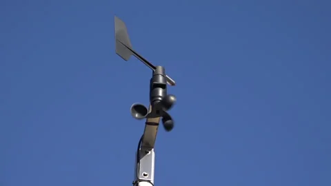 An Anemometer or Windmeter against a blue sky Stock Footage 239626911