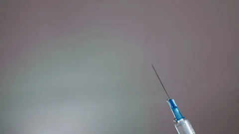 Anesthesia setup underway with focused medical staff and equipment. Sterile Stock Footage 337548933