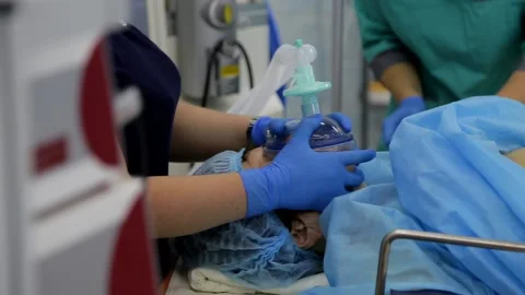 Anesthesia before surgery nurses hands Stock Footage 201285005