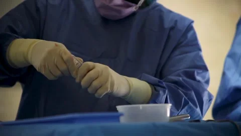 Anesthesiologist Preparing Anesthesia in Surgery Room Stock Footage 271351199
