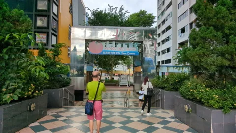 Ang mo kio town entry sign overhead move forward dolly Stock Footage 218244460