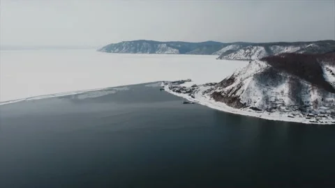 Angara riverbed in winter aerial view of the confluence of Angara river with Stock Footage 141409002