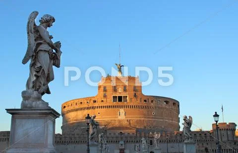 Angel and castle Stock Photos