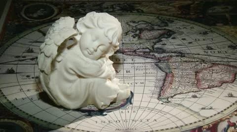 Angel and old map Vídeo Stock 12368692