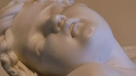  Angel Cupid Statue Breaking Bow Close Up on Face, 4K Video stock 55579266