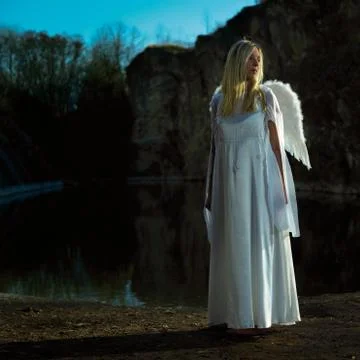 Angel in dark Stock Photos