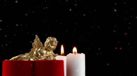 Angel Figurine &amp; Candles under Glittering Stars Stock Footage 59743434