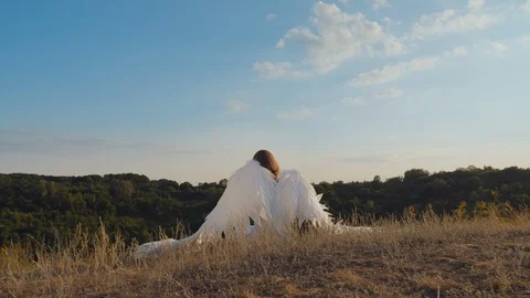 Angel flaps her wings Stock Footage 113139148
