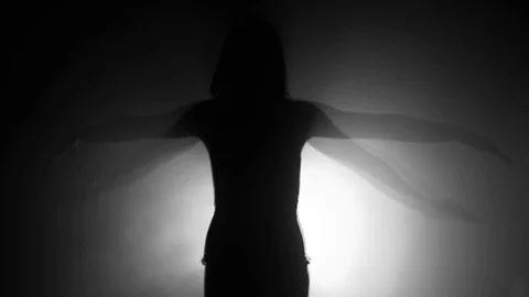 Angel in fog light Stock Footage 78690979