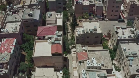 Angel Push Forward Drone shot for a suburban area rooftop in Amman - Jordan Stock Footage 297234901