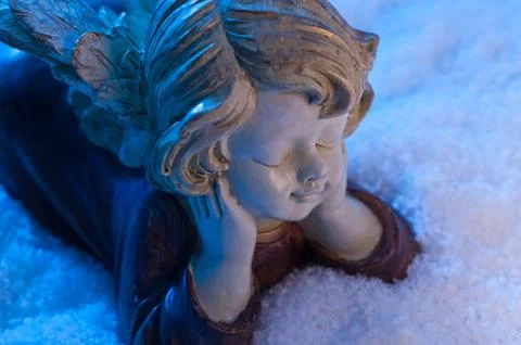 Angel in snow Stock Photos