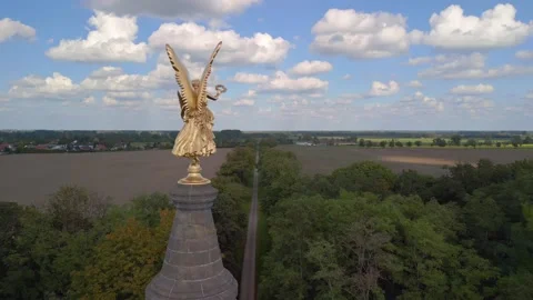 Angel standing on one leg on column.
Stunning aerial view flight very Stock Footage 219987853
