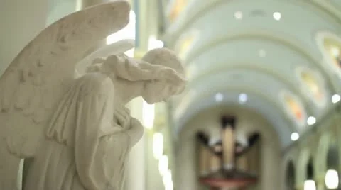 Angel statue inside cathedral Stock Footage 13524896