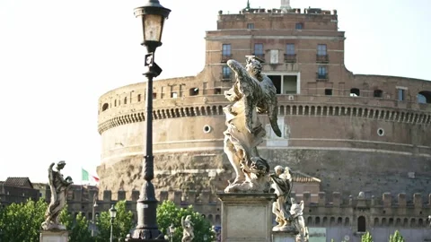 Angel statue on St. Angelo bridge to Castel Sant Angelo. Historic landmark Rome Stock Footage 222022928