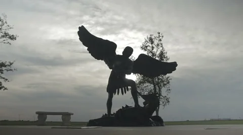 Angel Statue with Sun in Background Stock Footage 65050014