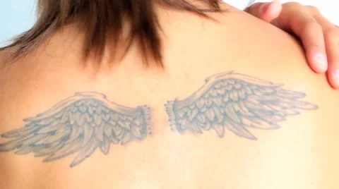 Angel wings tattoo Stock Footage 49804564